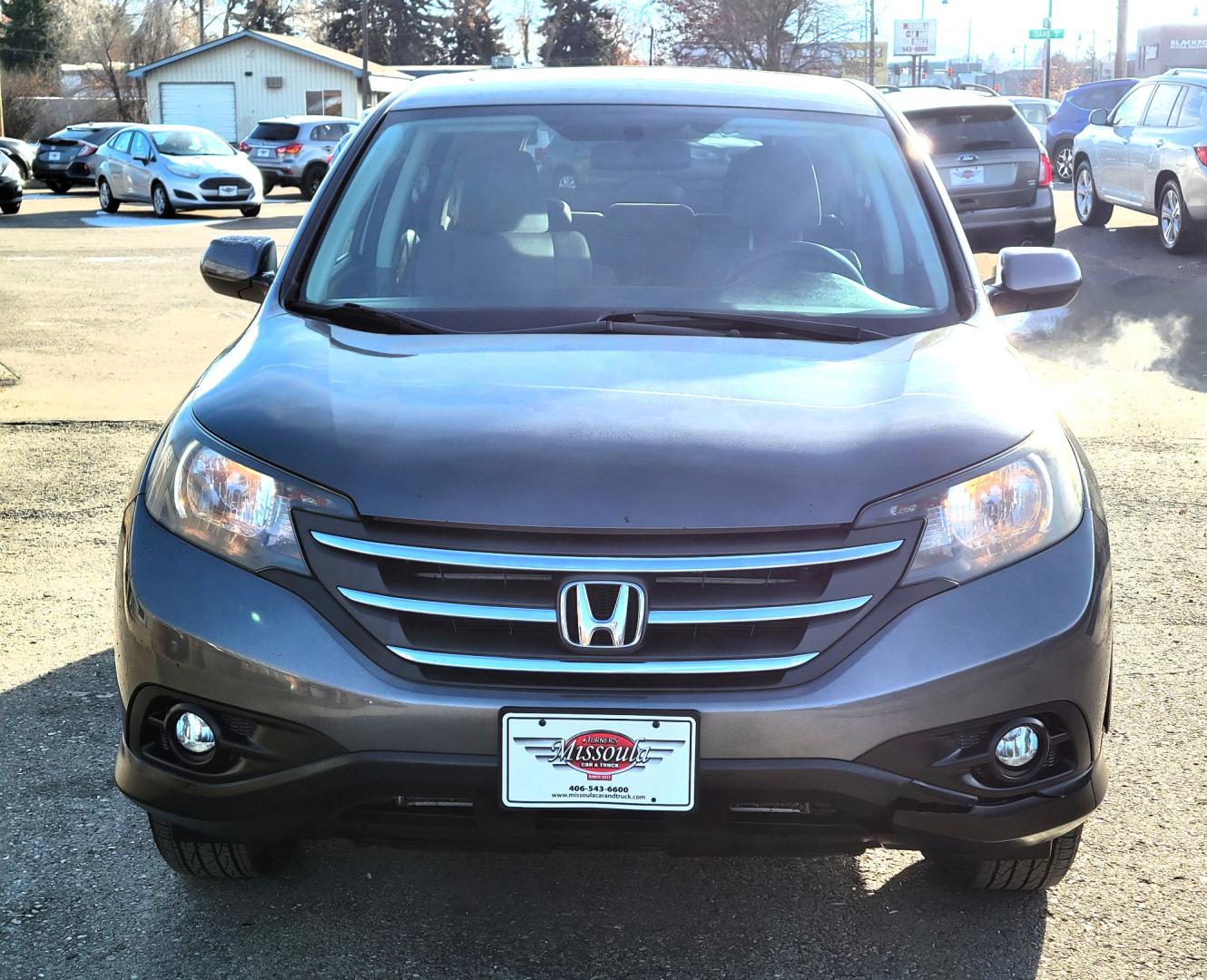 2012 Grey /Gray Honda CR-V EX (2HKRM4H50CH) with an 2.4L I4 engine, 5 Speed Automatic transmission, located at 450 N Russell, Missoula, MT, 59801, (406) 543-6600, 46.874496, -114.017433 - Nice AWD SUV. Automatic Transmission. Air. Cruise. Tilt. Power Sunroof. Power Windows and Locks., AM FM CD. Backup Camera - Photo#2